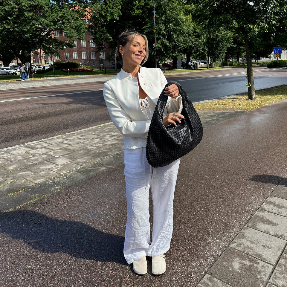 Jade – Lyxig flätad handväska